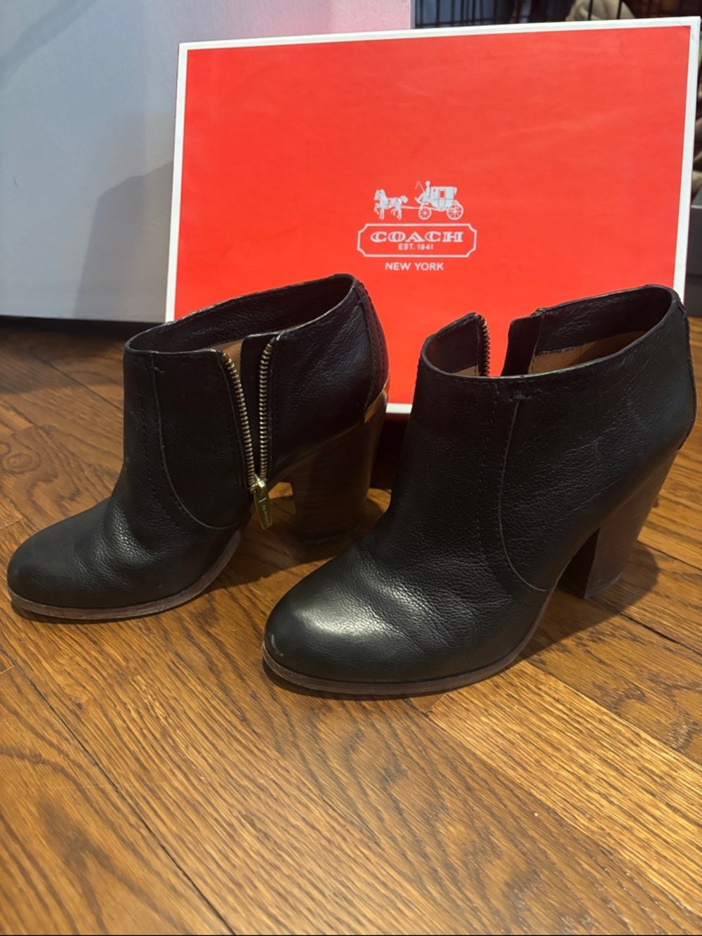 Coach Black Leather Ankle Booties with Gold Zip Accent